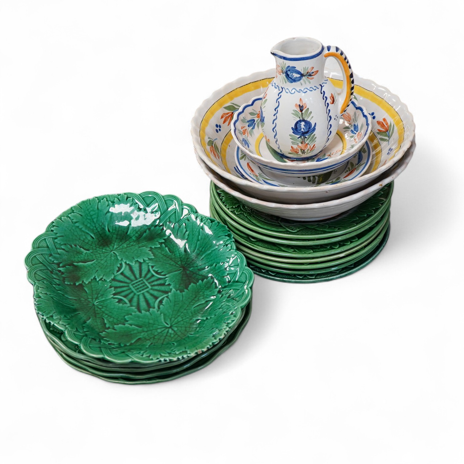 Quimper tableware (five) and eleven green-glazed leaf plates and similar dish- 17.5cm wide.